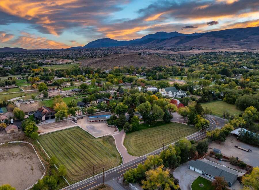 Experience luxury living in this expansive estate, perfect for equestrian enthusiasts.