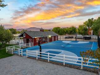 Experience outdoor recreation at its finest with this stunning multi-court facility, perfect for basketball and volleyball enthusiasts.
