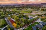 Experience luxury living in this stunning estate featuring a private basketball court and a vibrant equestrian facility, perfect for both recreation and training.