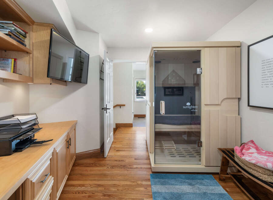 Experience ultimate relaxation in this home featuring a modern infrared sauna, perfect for unwinding after a long day.