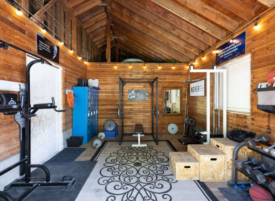 Transform your home into a personal fitness sanctuary with this fully equipped gym.