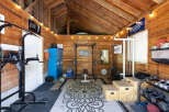 Transform your home into a personal fitness sanctuary with this fully equipped gym.