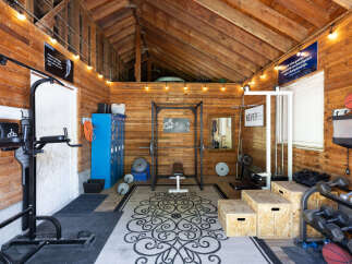 Transform your home into a personal fitness sanctuary with this fully equipped gym.