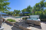 Experience ultimate relaxation in this backyard oasis, featuring a sparkling swimming pool and a luxurious hot tub perfect for unwinding.