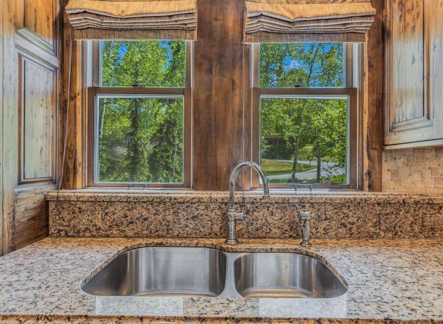 Experience the perfect blend of rustic charm and modern convenience in this stunning kitchen.