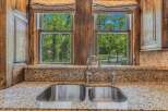 Experience the perfect blend of rustic charm and modern convenience in this stunning kitchen.