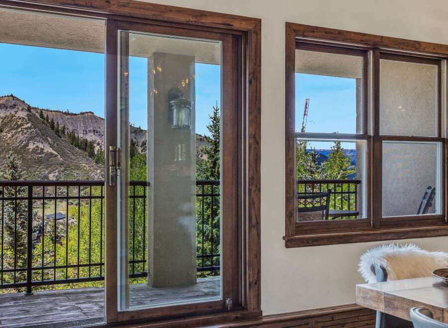 Experience breathtaking mountain views from this stunning property, featuring a spacious balcony perfect for enjoying the serene landscape.