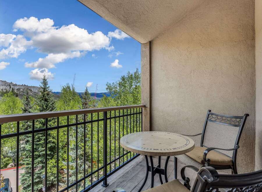 Enjoy breathtaking mountain views from this charming balcony, perfect for morning coffee or evening relaxation.