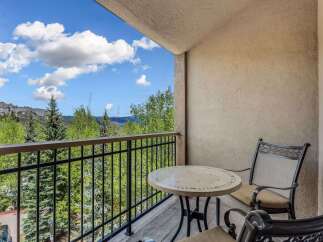 Enjoy breathtaking mountain views from this charming balcony, perfect for morning coffee or evening relaxation.