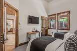 This charming bedroom features two comfortable beds, perfect for accommodating guests or family.