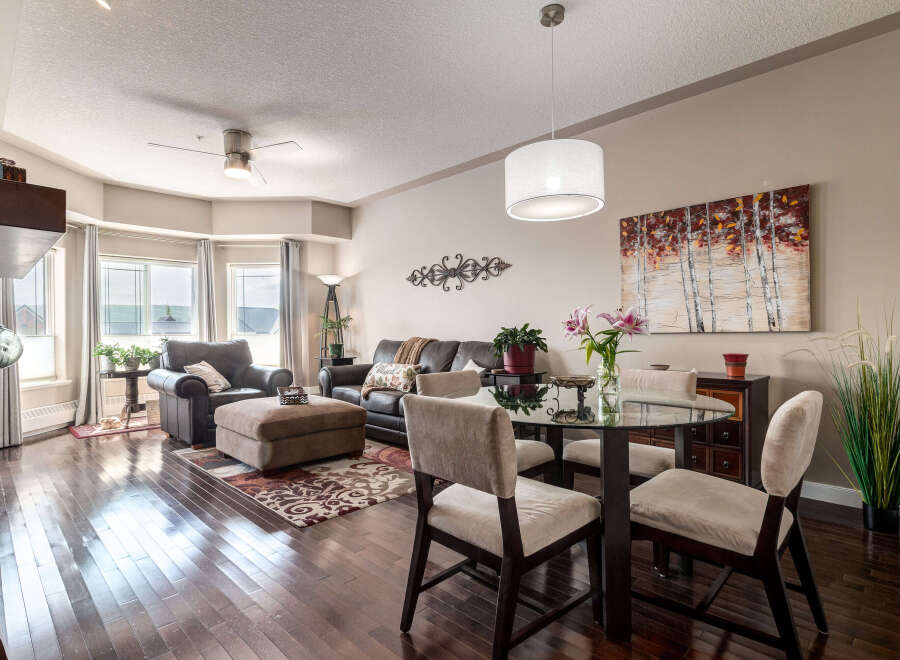 Experience elegant living in this spacious condo featuring a combined living and dining area.