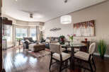 Experience elegant living in this spacious condo featuring a combined living and dining area.