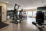Stay active and healthy in this well-equipped fitness center, featuring a variety of strength training machines and cardio equipment.