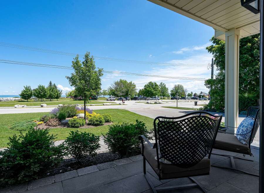 Enjoy serene lake views from this charming property, perfect for relaxing evenings on the porch.
