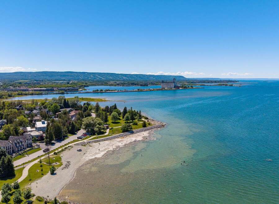 Experience waterfront living at its finest with this stunning property offering panoramic views of the crystal-clear blue waters.
