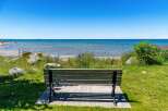 Enjoy serene lakefront living with this picturesque view, perfect for a peaceful retreat.