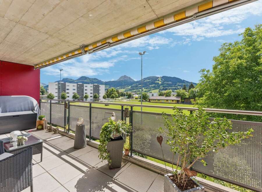 Enjoy breathtaking mountain views from this spacious balcony, perfect for outdoor relaxation and entertaining.