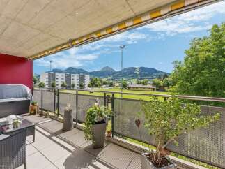 Enjoy breathtaking mountain views from this spacious balcony, perfect for outdoor relaxation and entertaining.