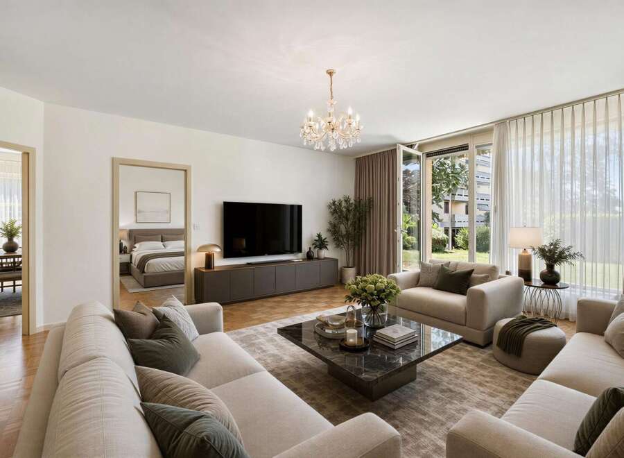Experience luxurious living in this stunning open-concept living space, featuring a modern entertainment center and a sophisticated marble coffee table.