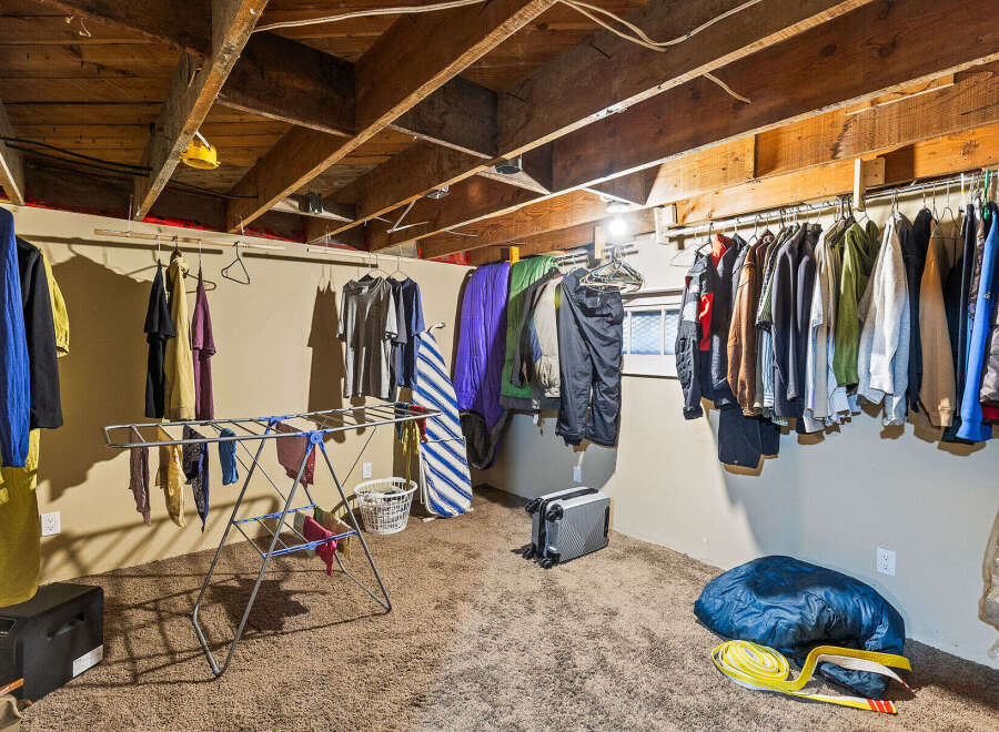 Discover ample storage and organization solutions in this versatile basement space.