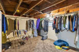 Discover ample storage and organization solutions in this versatile basement space.