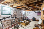 Discover potential in this unfinished basement, offering a versatile space for storage or future customization.