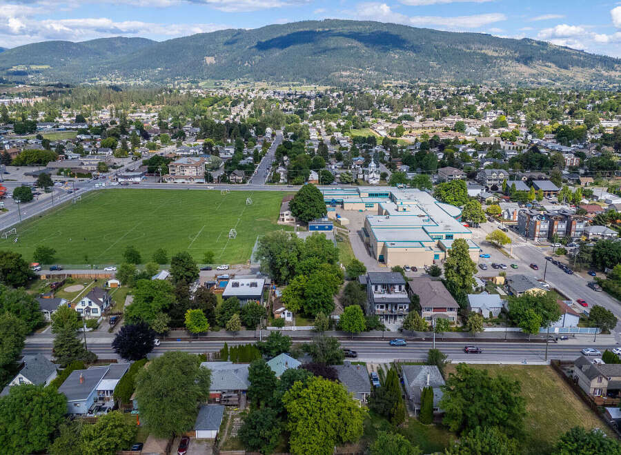 Discover this prime real estate opportunity featuring a spacious school complex adjacent to a vibrant community sports field.