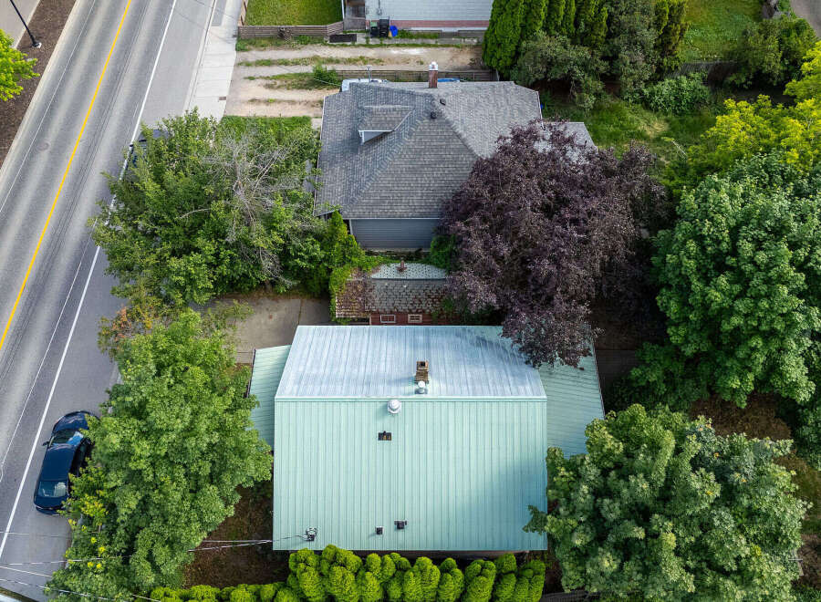 Discover this charming property featuring a spacious main house with a durable metal roof and a separate accessory dwelling unit, perfect for extended family or rental income.
