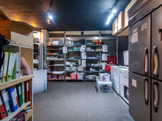 Discover a well-organized commercial kitchen space, perfect for culinary ventures.