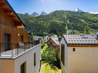 Experience breathtaking mountain views from this stunning property, nestled amidst lush green forests and majestic peaks.