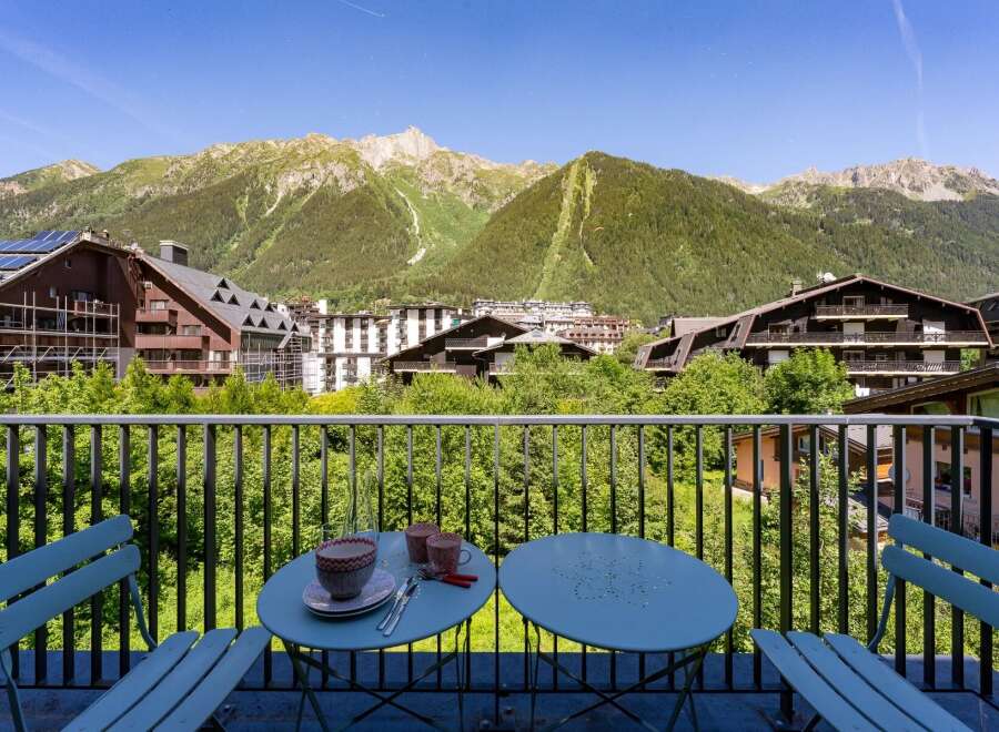 Enjoy breathtaking mountain views from this charming balcony, perfect for your morning coffee or evening relaxation.