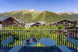 Enjoy breathtaking mountain views from this charming balcony, perfect for your morning coffee or evening relaxation.