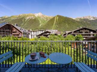 Enjoy breathtaking mountain views from this charming balcony, perfect for your morning coffee or evening relaxation.