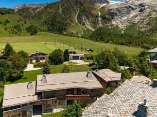 Nestled in a picturesque mountain village, this charming property offers a serene escape with stunning alpine views.