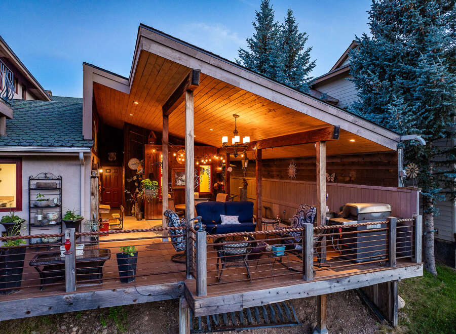 Enjoy outdoor living on this expansive deck, perfect for entertaining or relaxing.
