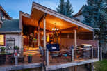 Enjoy outdoor living on this expansive deck, perfect for entertaining or relaxing.
