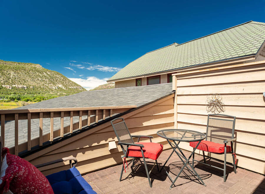 Enjoy breathtaking mountain views from this charming balcony, perfect for morning coffee or evening relaxation.