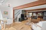 Discover this stunning open-concept living space, perfect for modern living and entertaining.