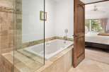 Indulge in relaxation with this luxurious jetted bathtub, perfect for unwinding after a long day.