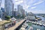 Experience luxury waterfront living in this stunning condo with breathtaking views of the marina and city skyline.