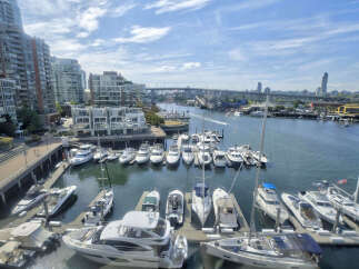Experience luxury waterfront living with this stunning property offering direct access to a private marina.