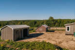 Discover this charming rural property featuring multiple outbuildings, perfect for storage or equestrian use.