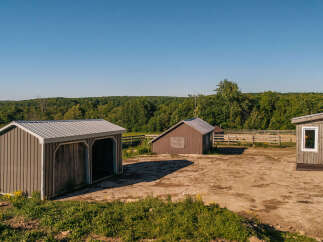 Discover this charming rural property featuring multiple outbuildings, perfect for storage or equestrian use.