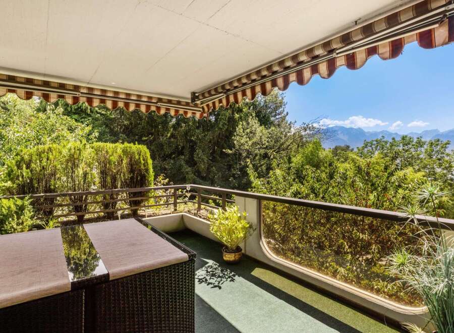 Enjoy breathtaking mountain views from this charming balcony, perfect for al fresco dining or morning coffee.