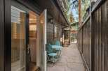 Step outside into a charming patio area, perfect for enjoying your morning coffee or evening drinks.
