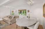 Experience elegant living in this beautifully appointed dining and living area.