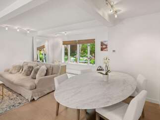 Experience elegant living in this beautifully appointed dining and living area.