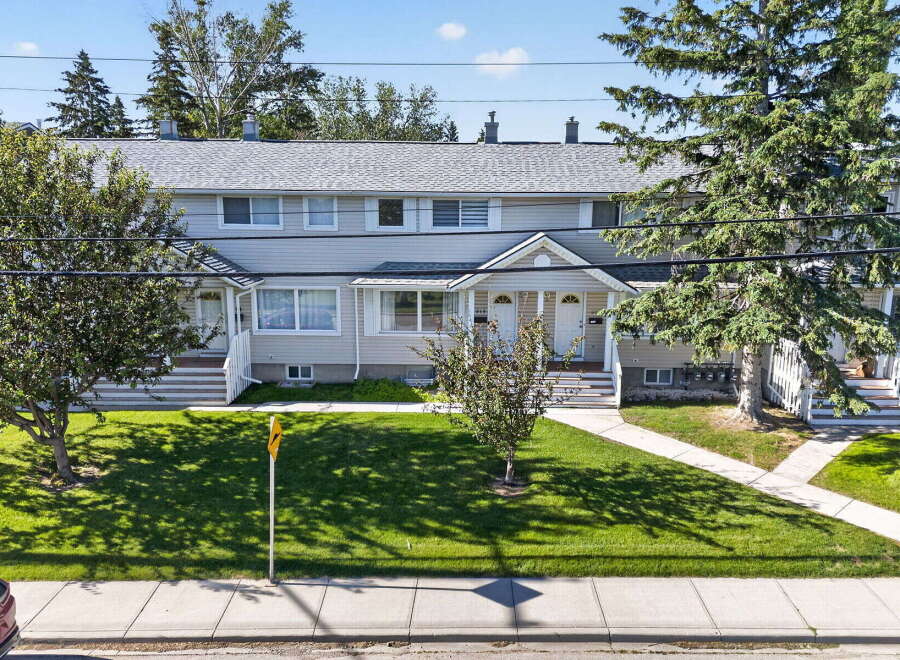 Discover this charming duplex, offering comfortable living spaces and a well-maintained exterior.