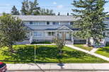 Discover this charming duplex, offering comfortable living spaces and a well-maintained exterior.