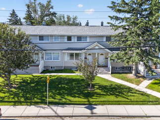 Discover this charming duplex, offering comfortable living spaces and a well-maintained exterior.